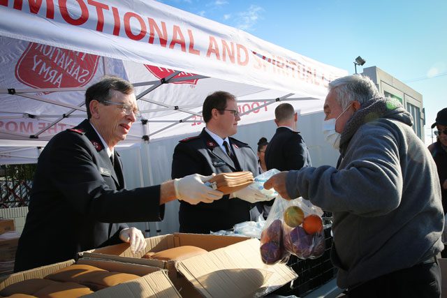 Senior receiving food