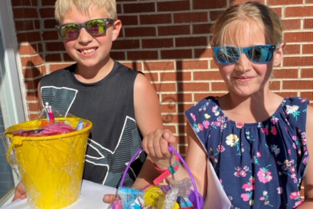 Young boy and girl with easter baskets