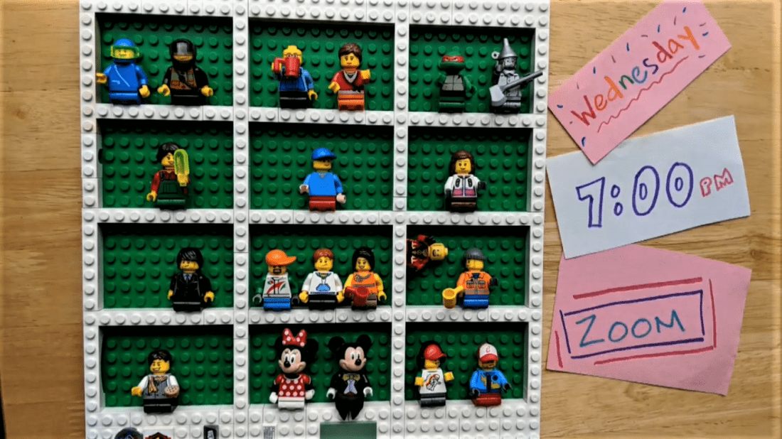 Various Legos on green lego board