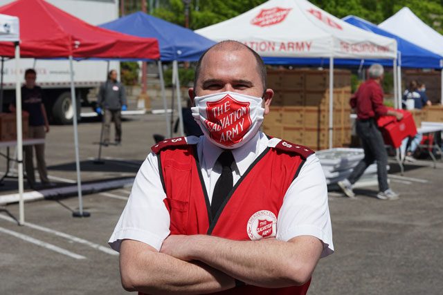 EDS worker in mask