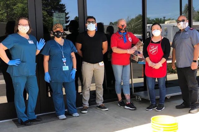 Group outside with masks