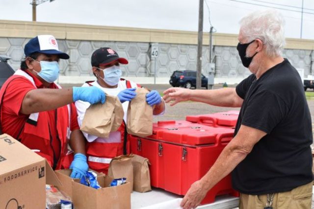 EDS workers distributing supplies