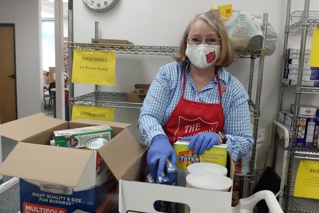 Woman in food pantry