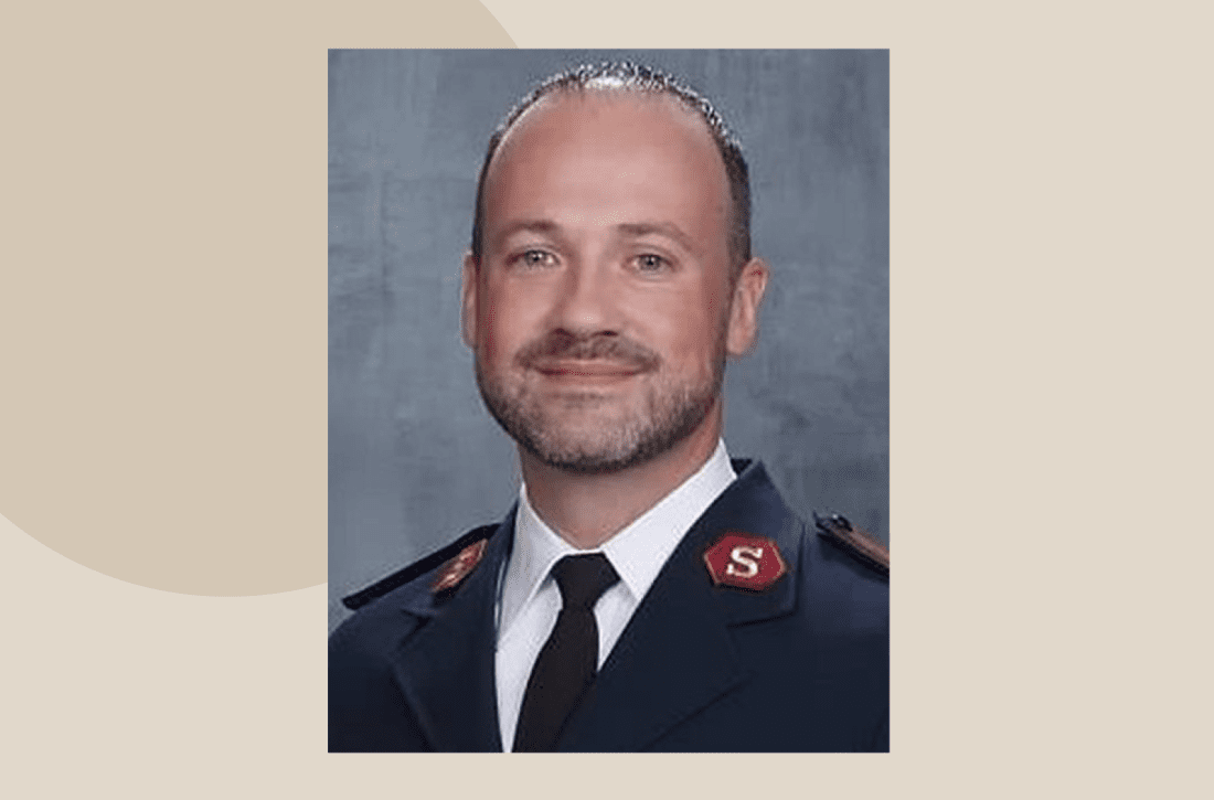 male salvation army officer (pastor) smiling in a portrait