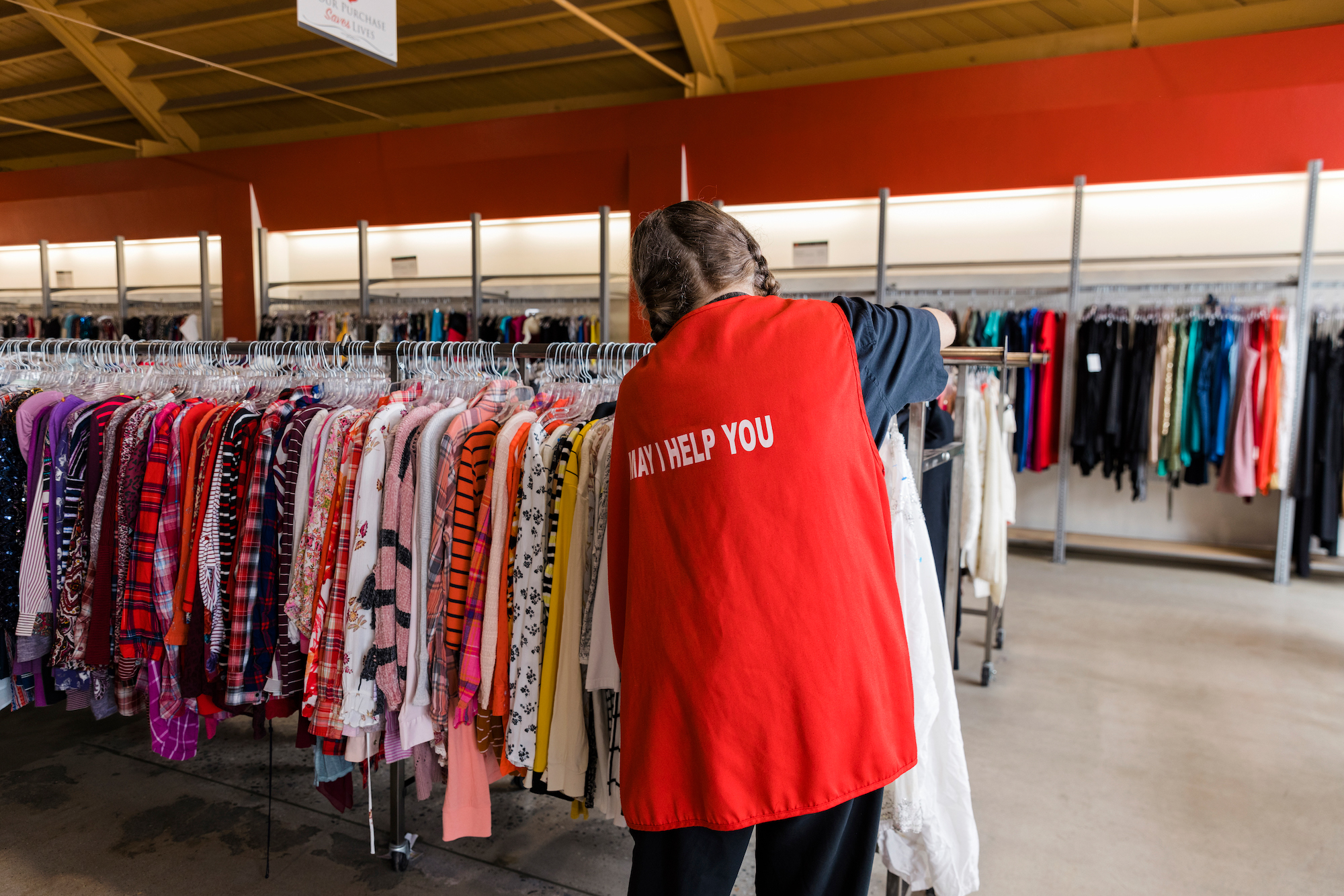 woman working in a thrift store