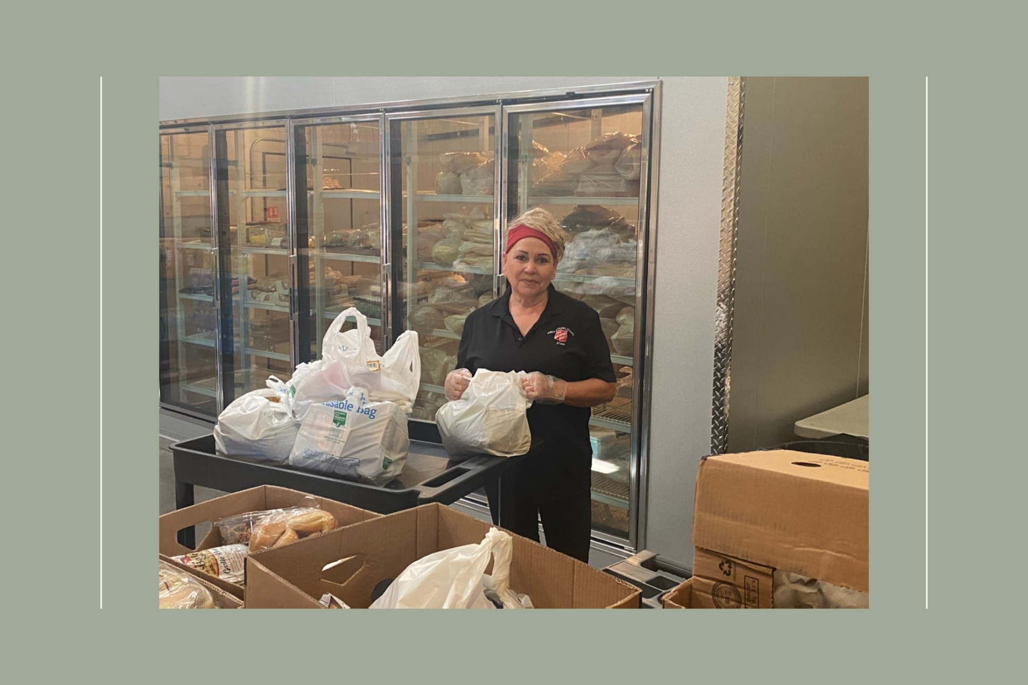 volunteer sorts food donations in a pantry