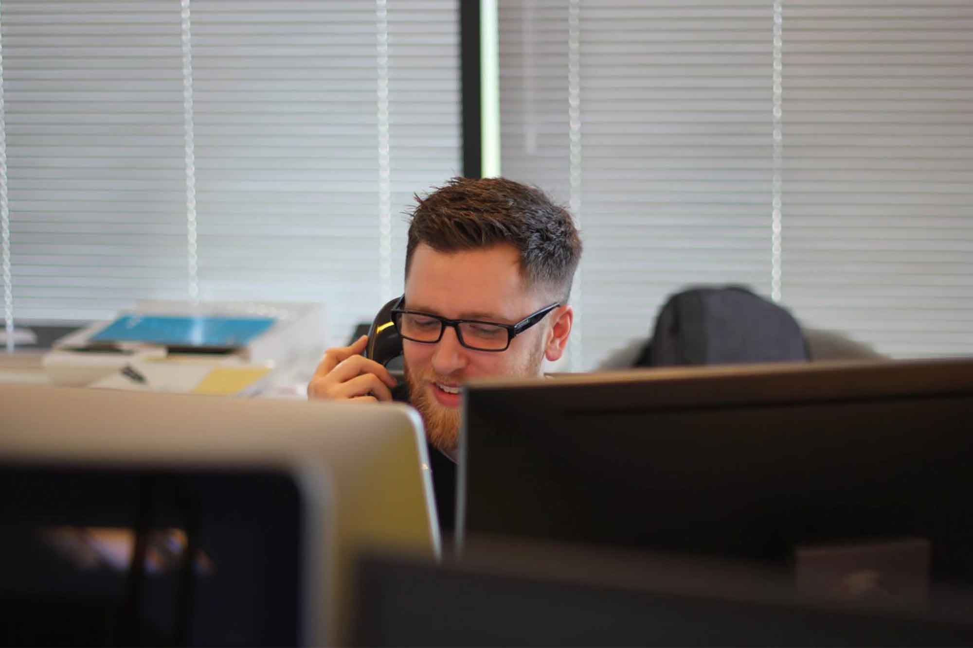 Salvation Army employee answers the phone at the Intermountain Connection Center