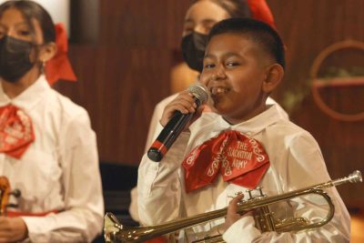 Students play mariachi music with The Salvation Army L.A. Red Shield's Rayos Del Sol.