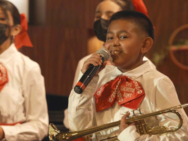 Students play mariachi music with The Salvation Army L.A. Red Shield's Rayos Del Sol.