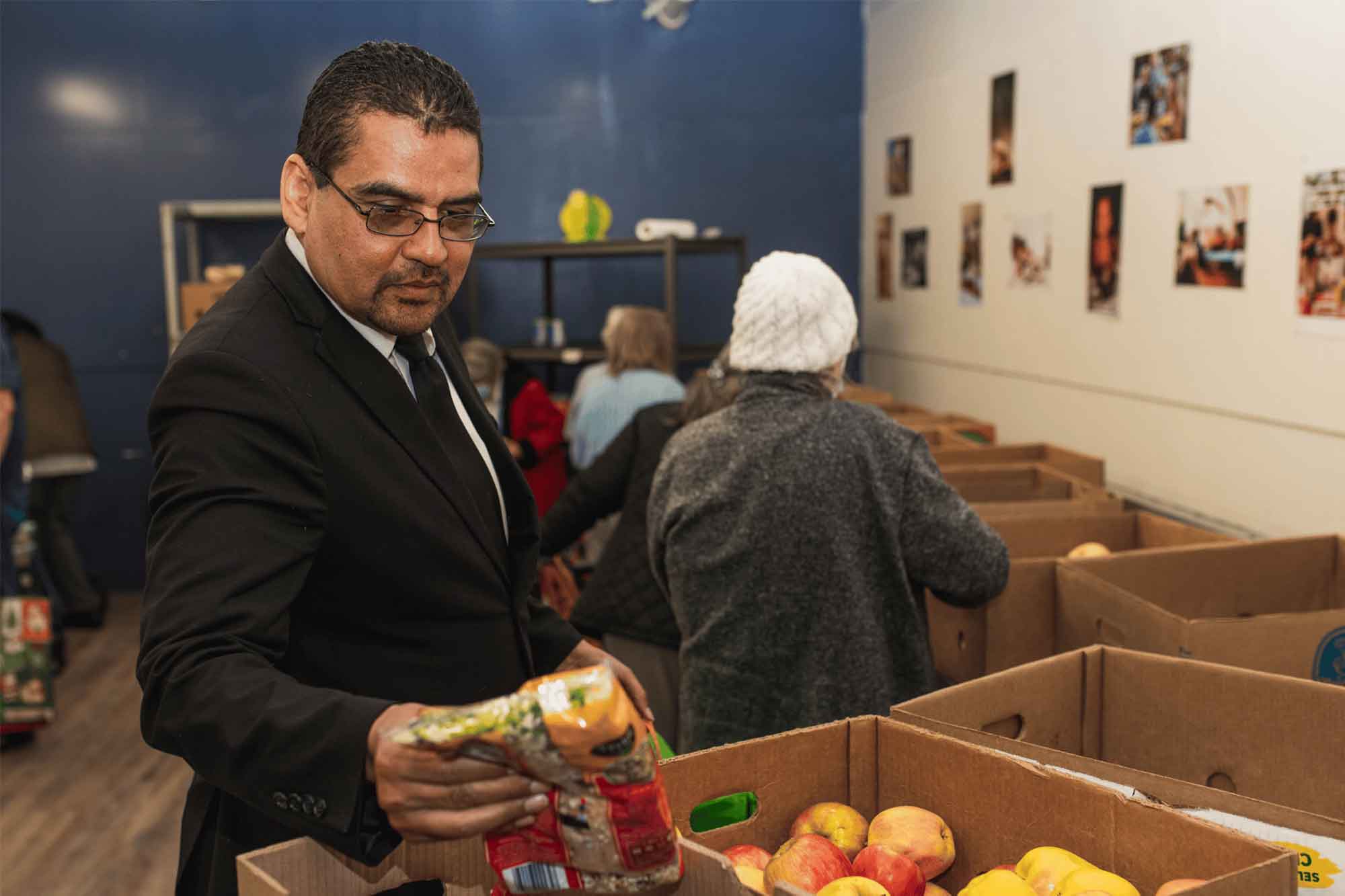 Robert Frederiksen selects food at The Salvation Army White Center Corps food pantry.