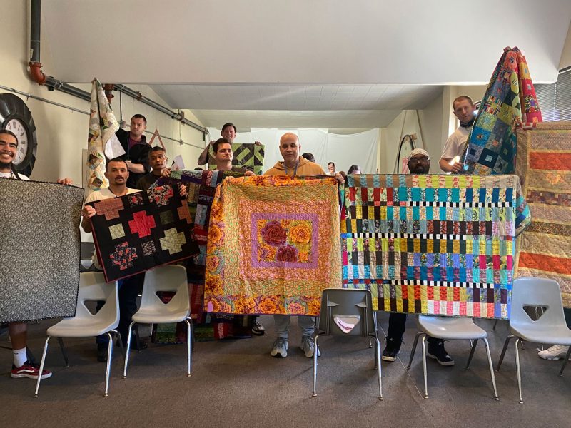 Quilts bring 'hug' of encouragement to men at Joseph McFee center