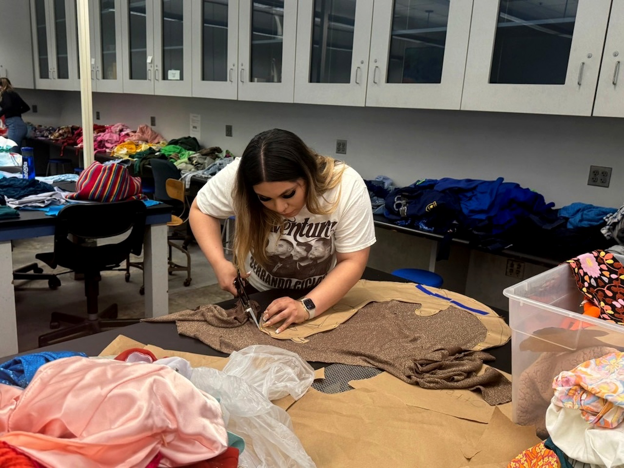 Students craft ocean murals with recycled clothes from The Salvation Army