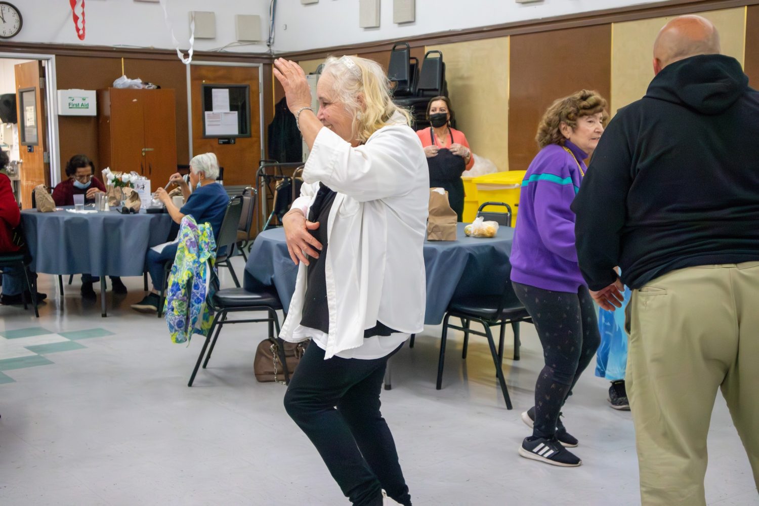 Karaoke plus a hot meal equal a recipe for joy for Club 60 seniors