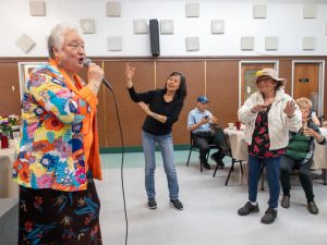 Karaoke plus a hot meal equal a recipe for joy for Club 60 seniors